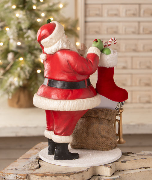 Santa Filling the Stocking